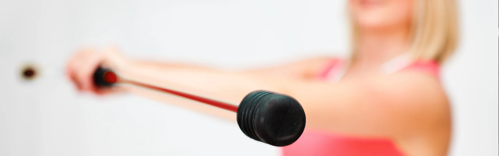 Women trains with swing stick Women trains with swing stick